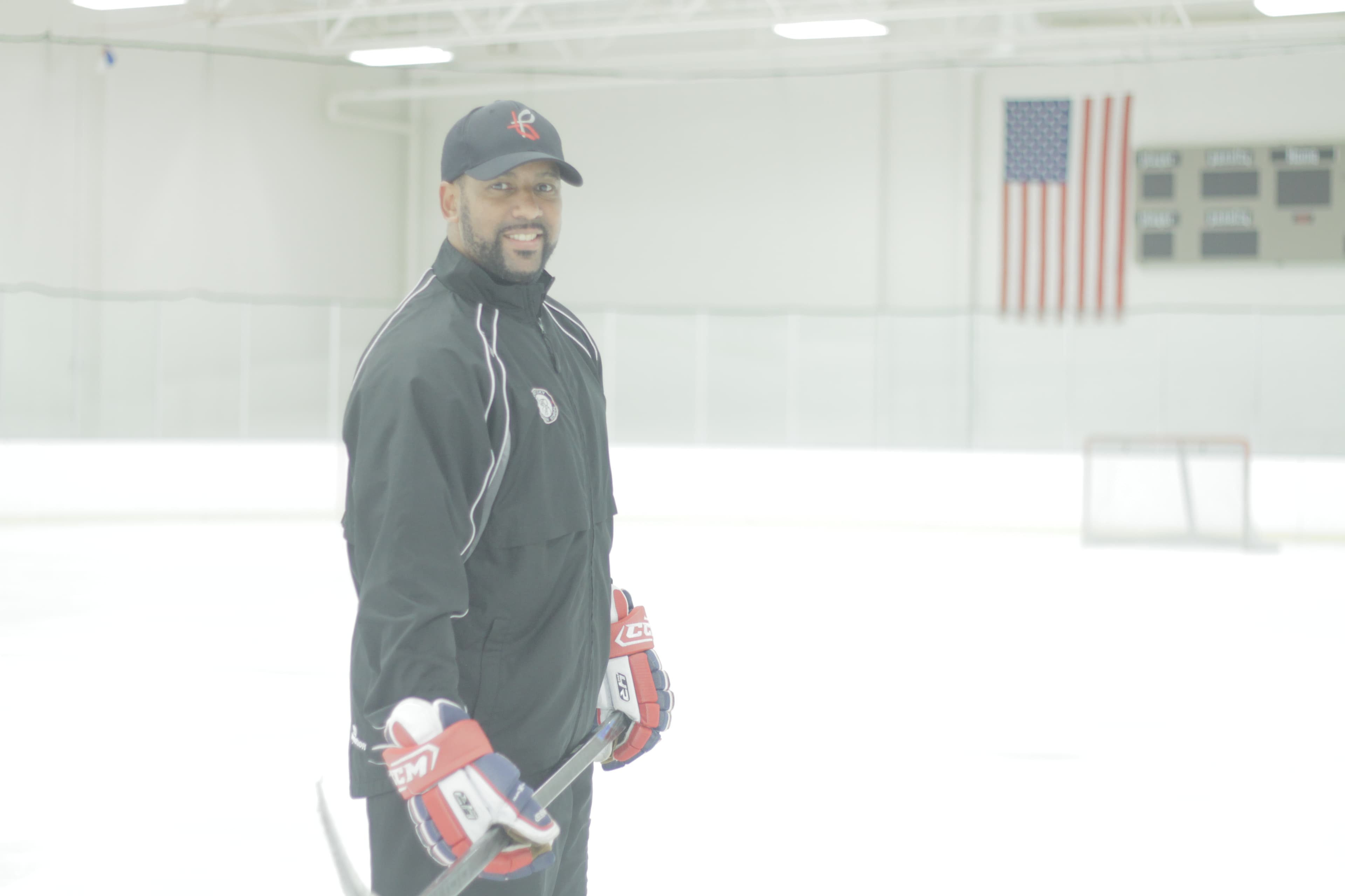 Brad Perry on the ice ready to coach