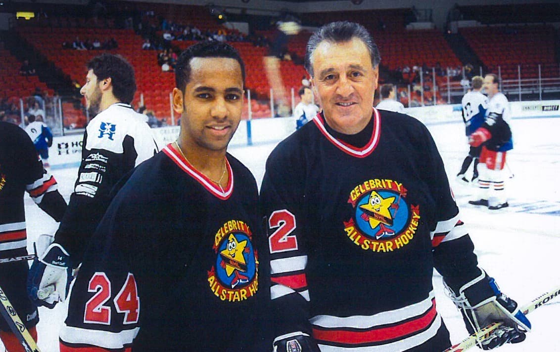 Brad Perry with Phil Esposito at the Celebrity All-Star game