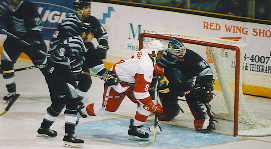 Brad Perry driving to the net during a game