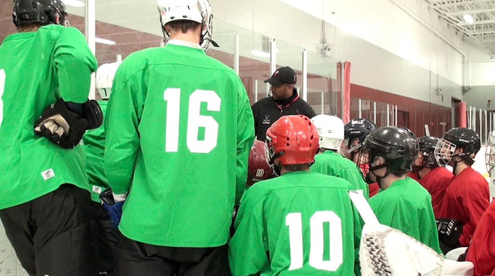 Brad Perry coaching a team on the ice